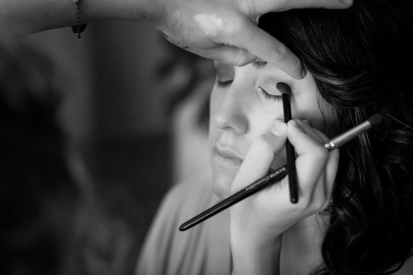 Bride getting makeup done
