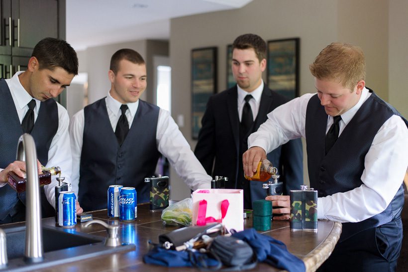 Groomsmen with flasks