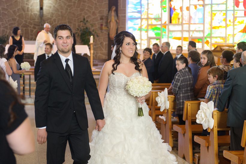 Couple walking down the aisle
