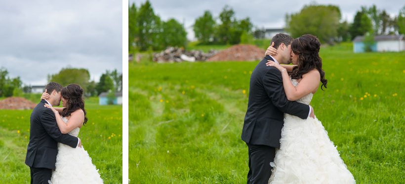couple kissing in a field