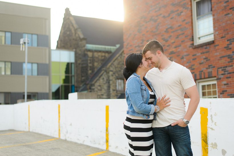 Couple on rooftop parking garage