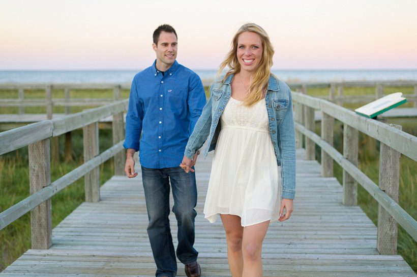 Couple walking on boardwalk