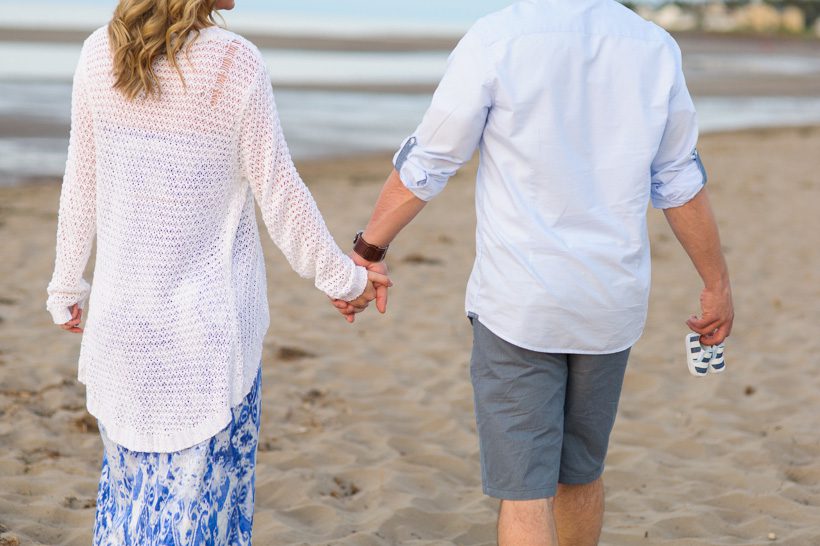 Couple walking on Parlee Beach