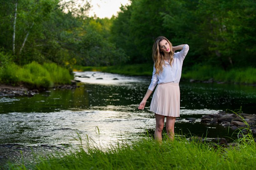 Model standing in river