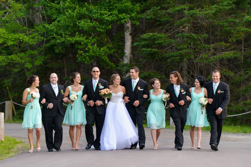 mint bridal party walking