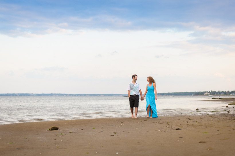 couple walking on beach in Shediac