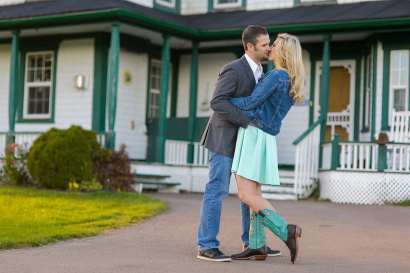 Couple in front of old farm house