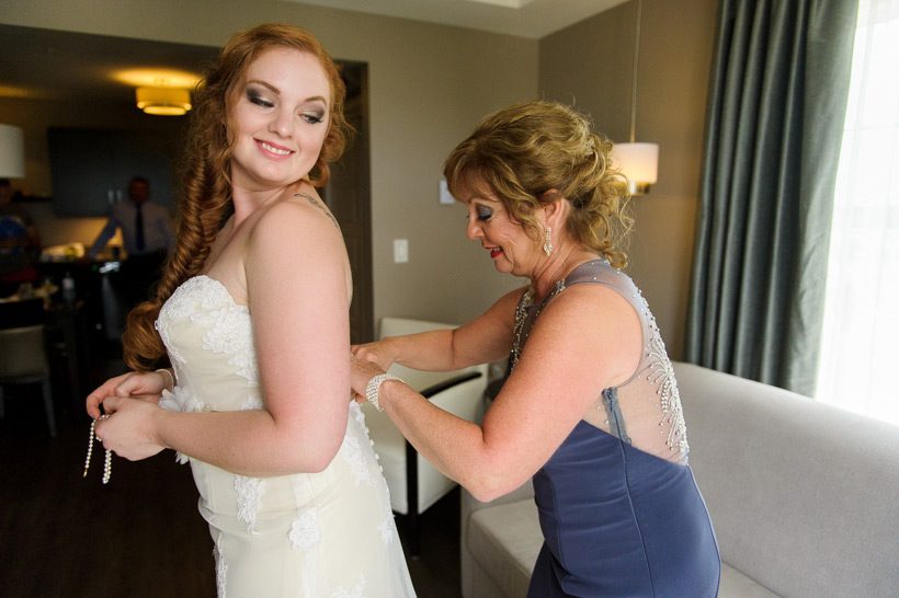 mother helping bride in shediac hotel