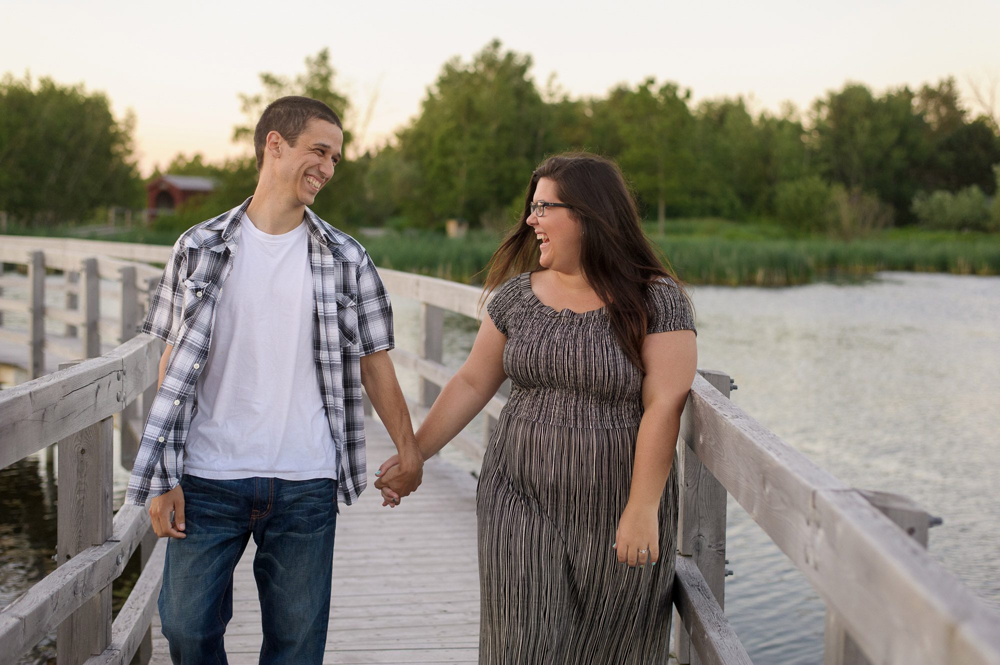 Couple walking on boardwalk