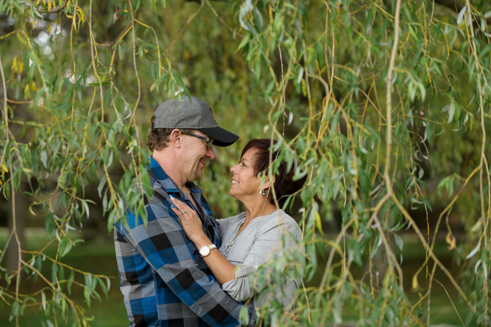 Couple under willow tree