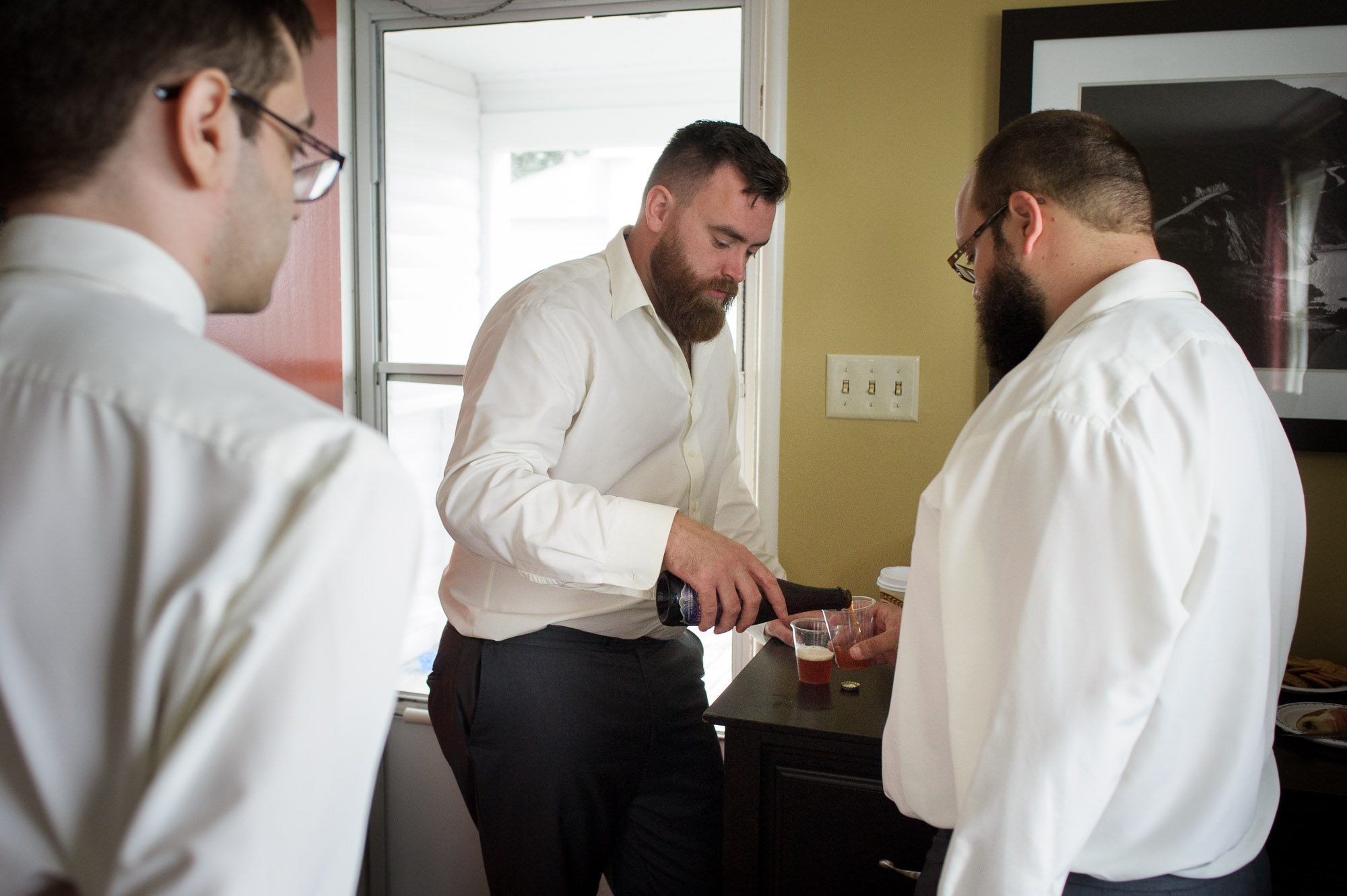 Guys getting ready on wedding day