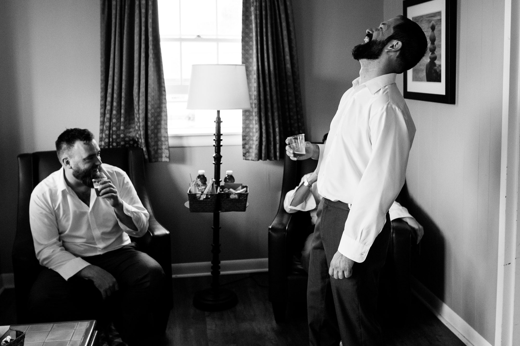 Groom with groomsmen getting ready