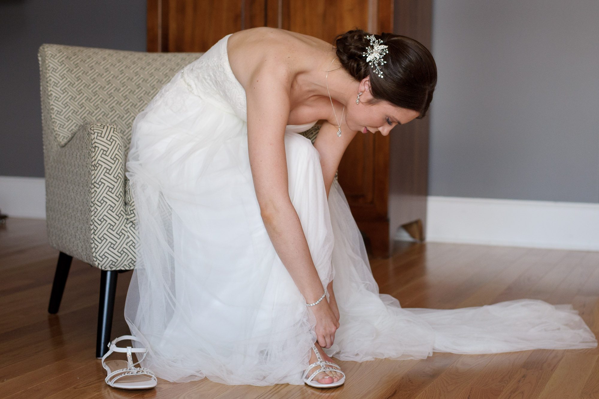 Bride putting on shoes