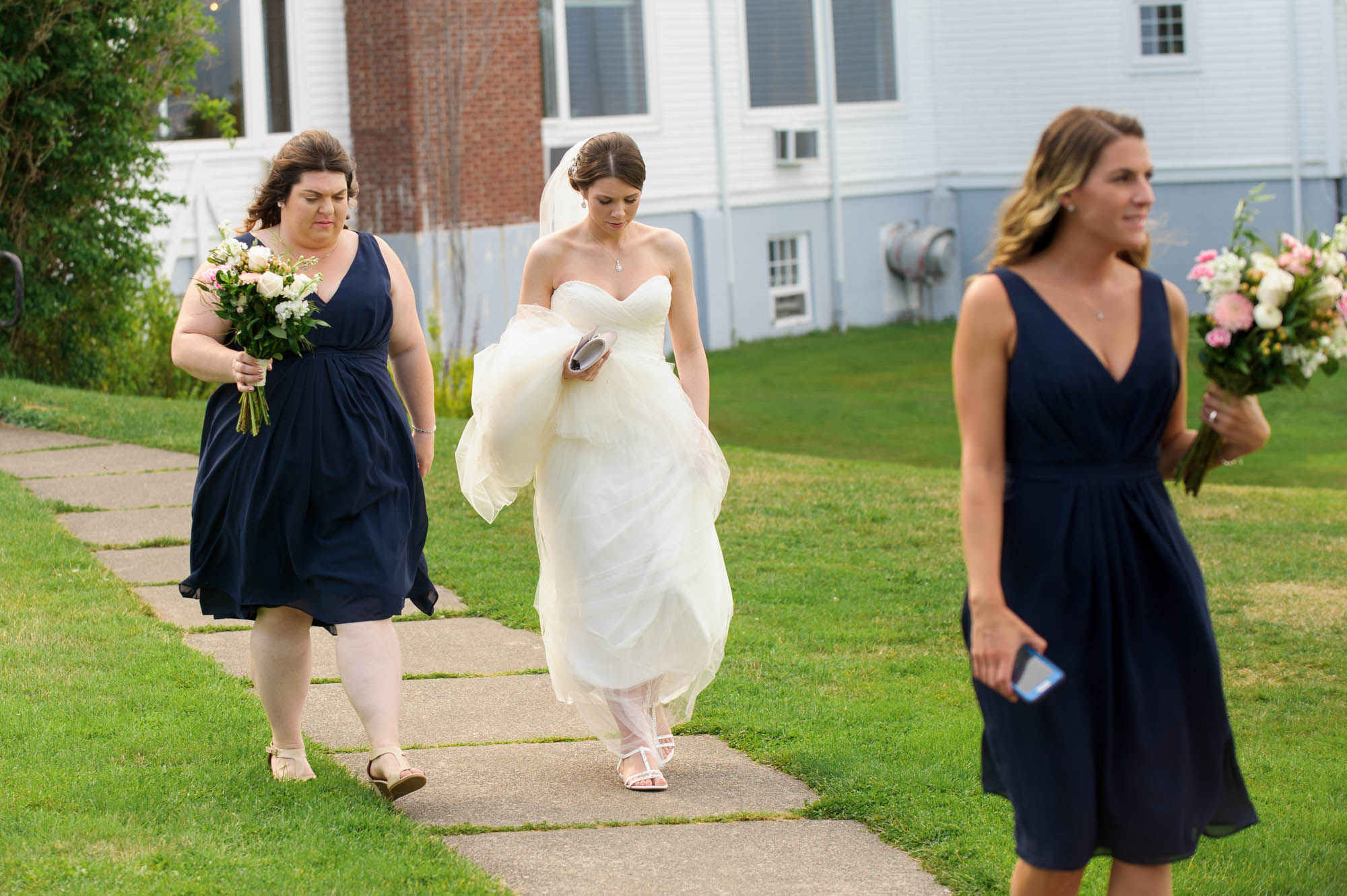 Bride and bridesmaids walking