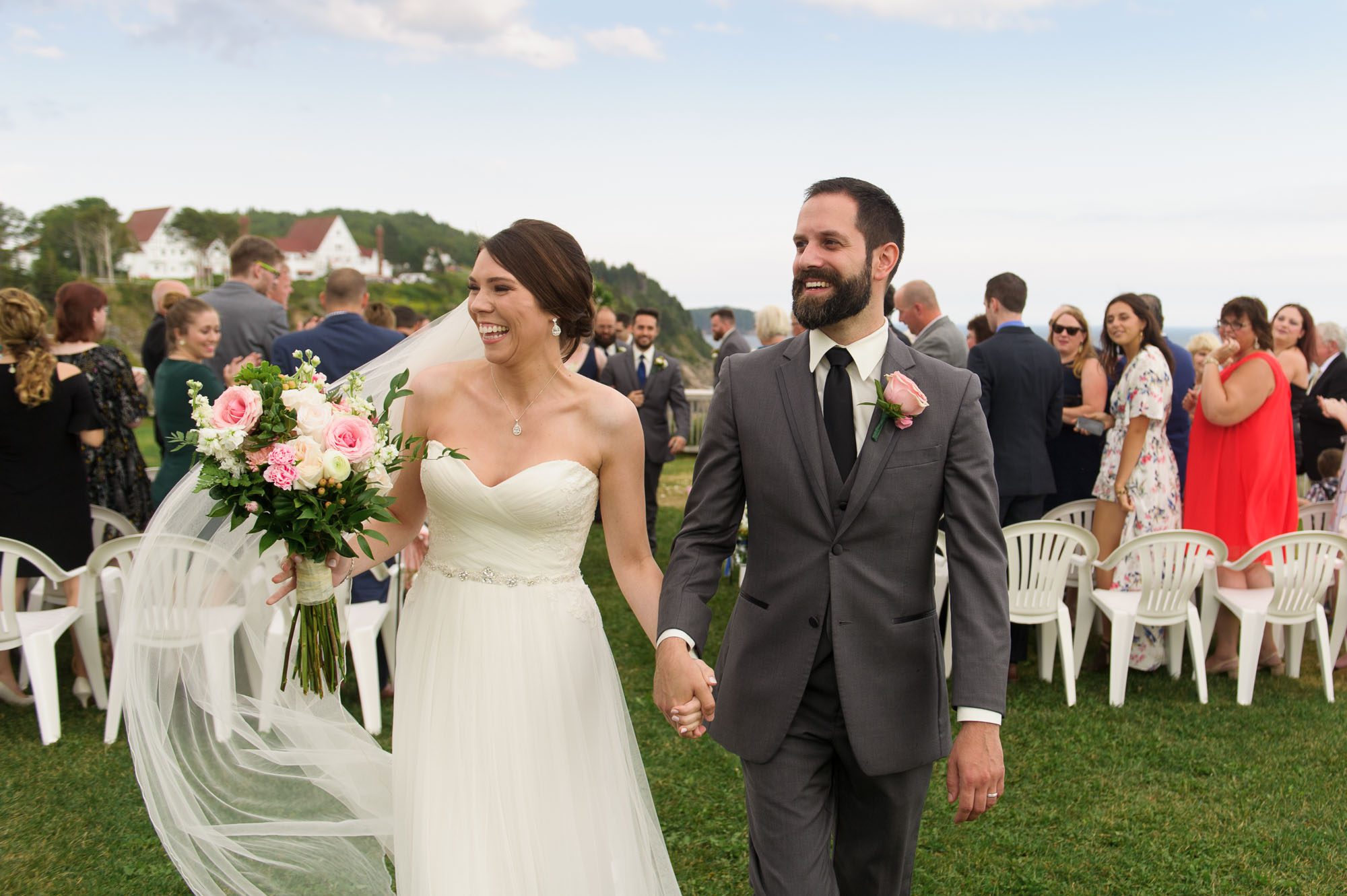 Bride and groom walking down the aisle