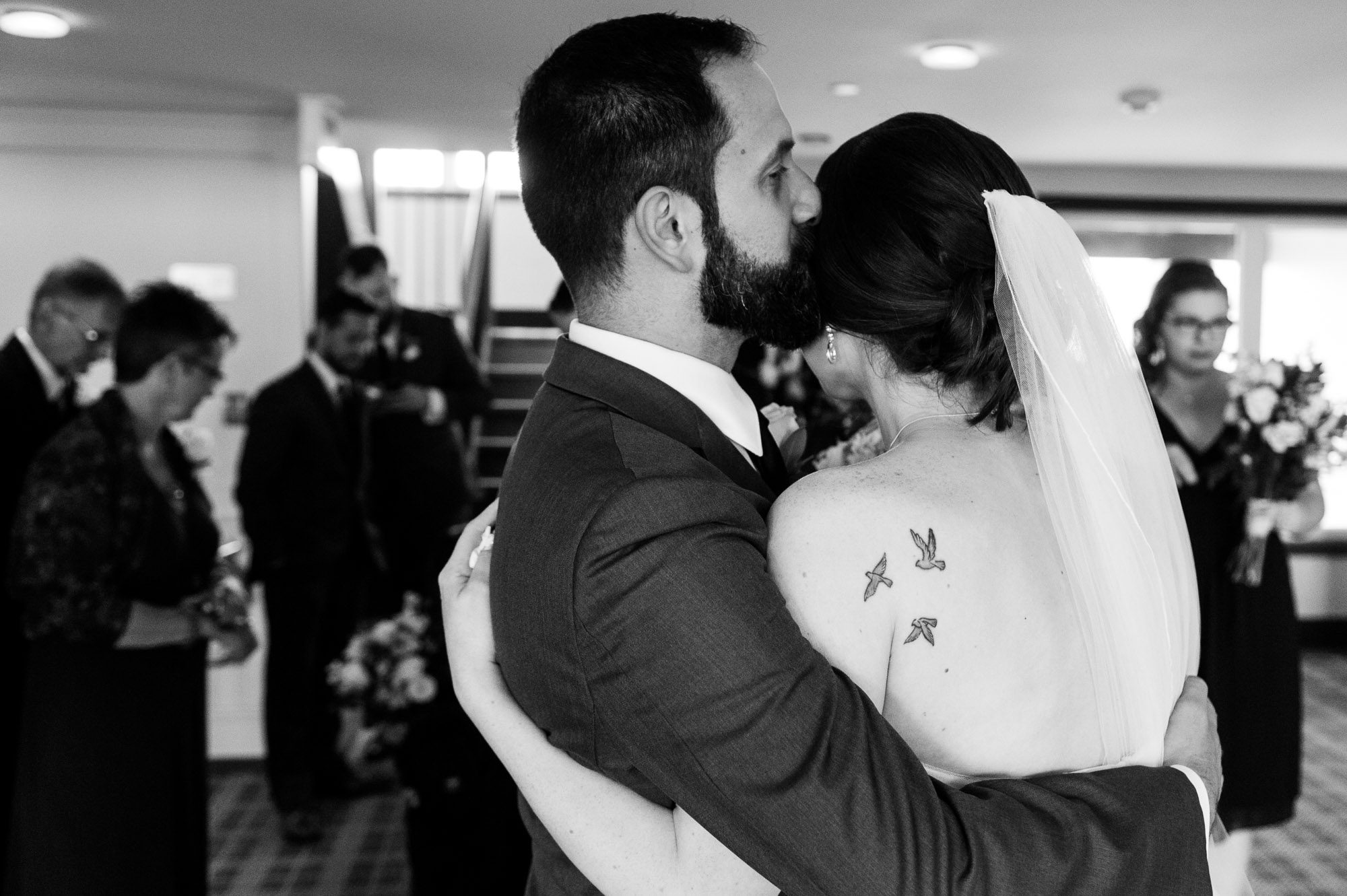 Intimate moment between bride and groom