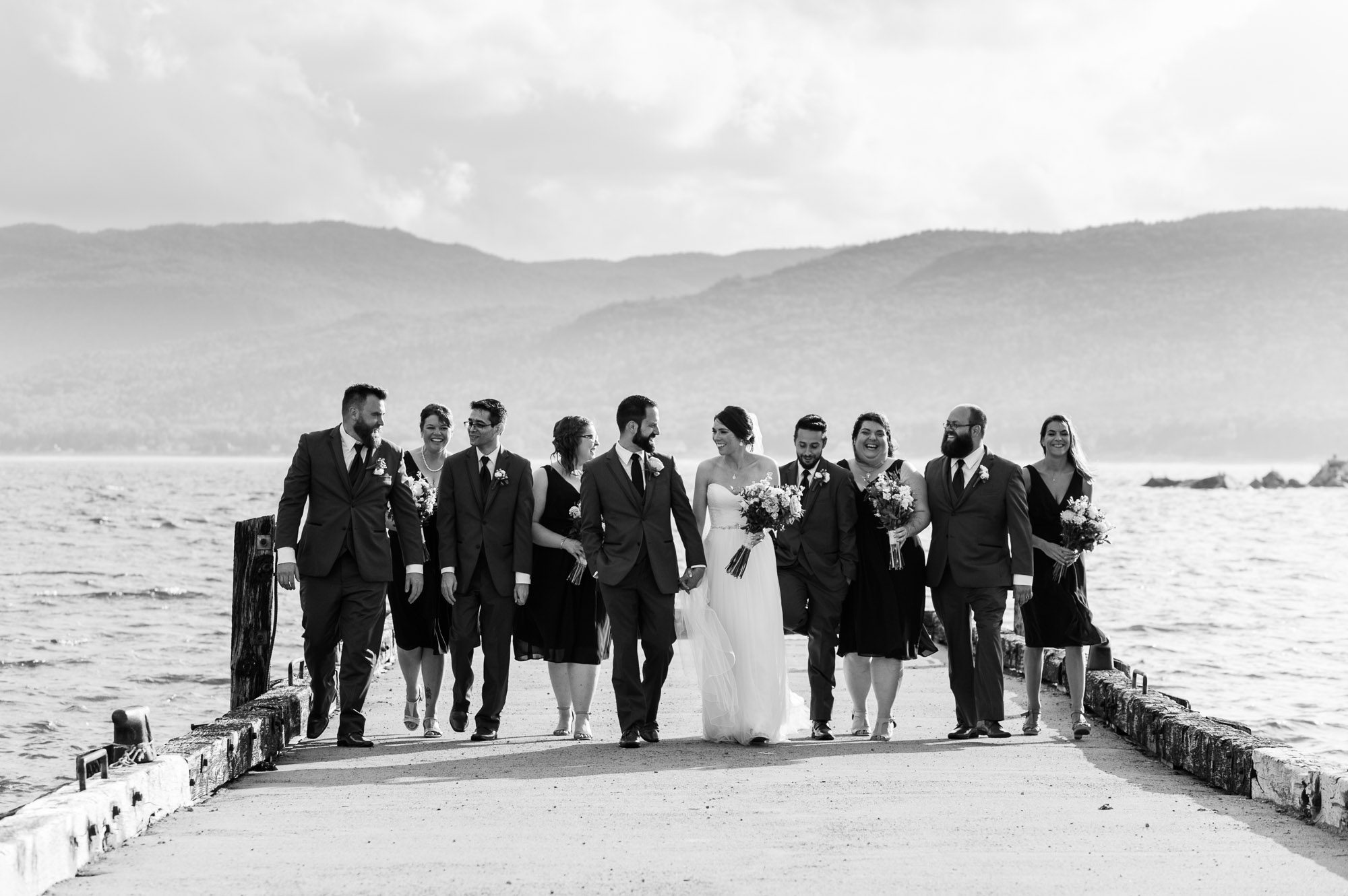 Bridal party walking on warf