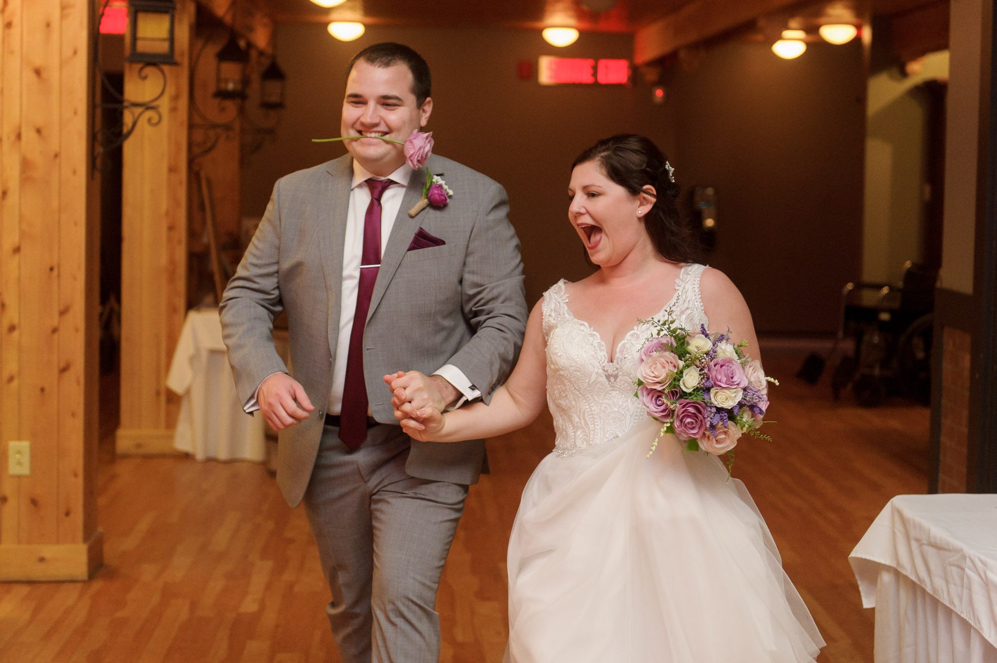 Bride and groom wedding reception entrance
