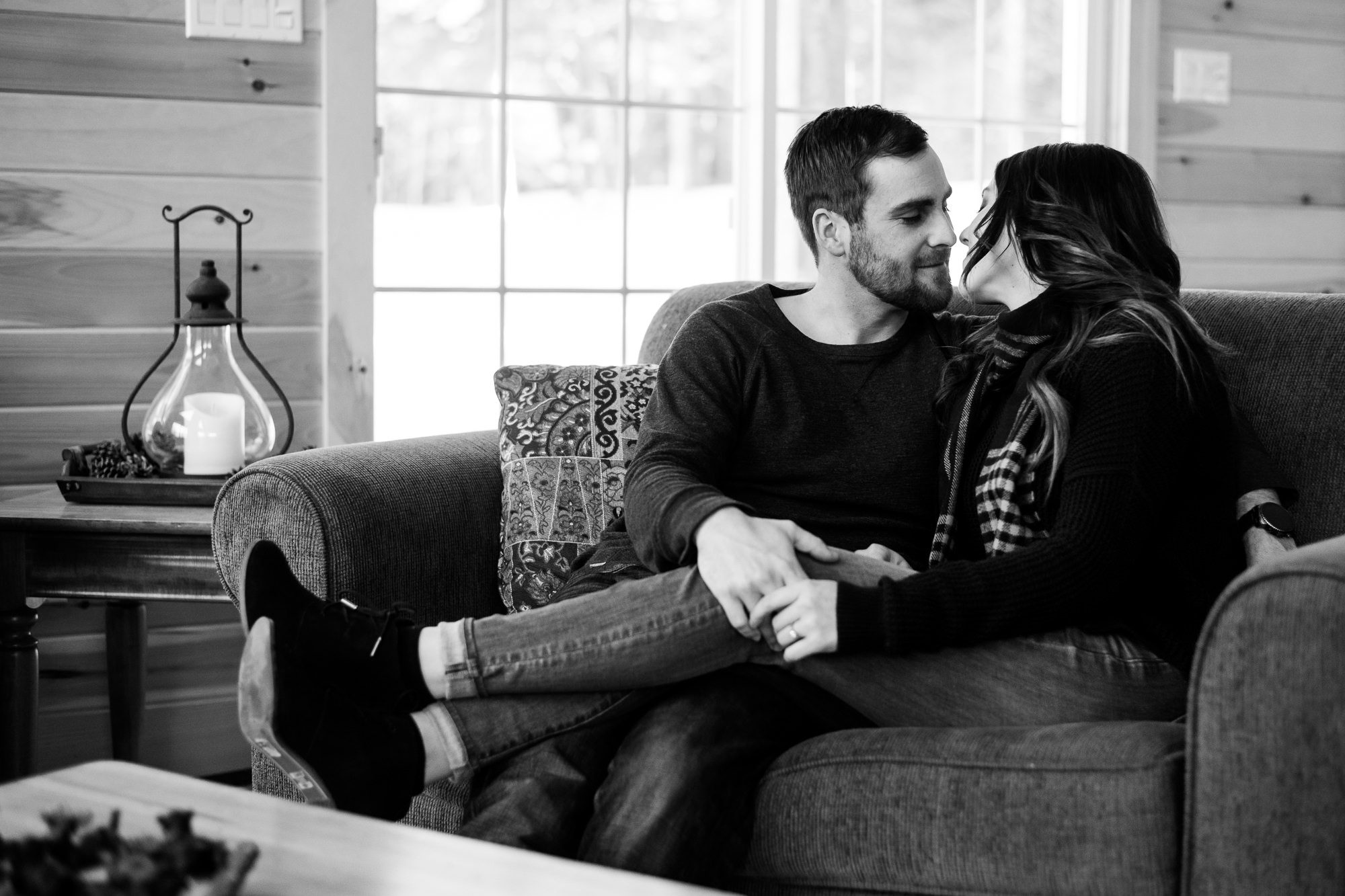 Couple kissing on the couch