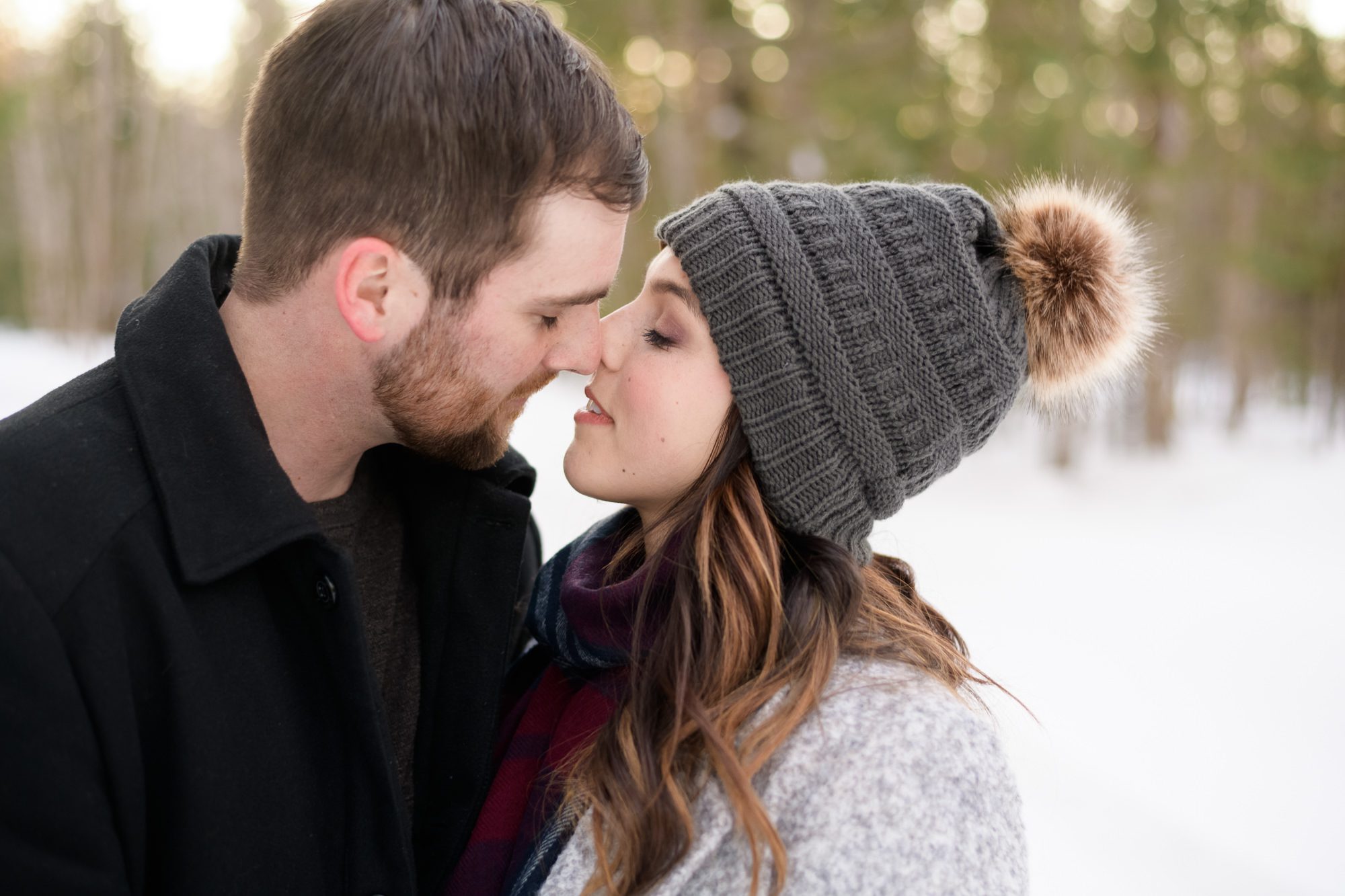 Couple kissing - Winter engagement photography