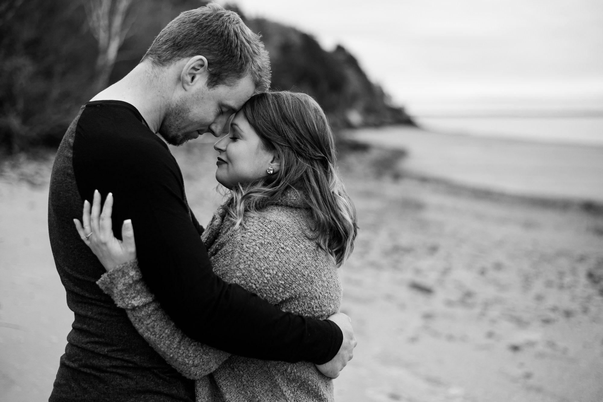 Couple hugging on the beach